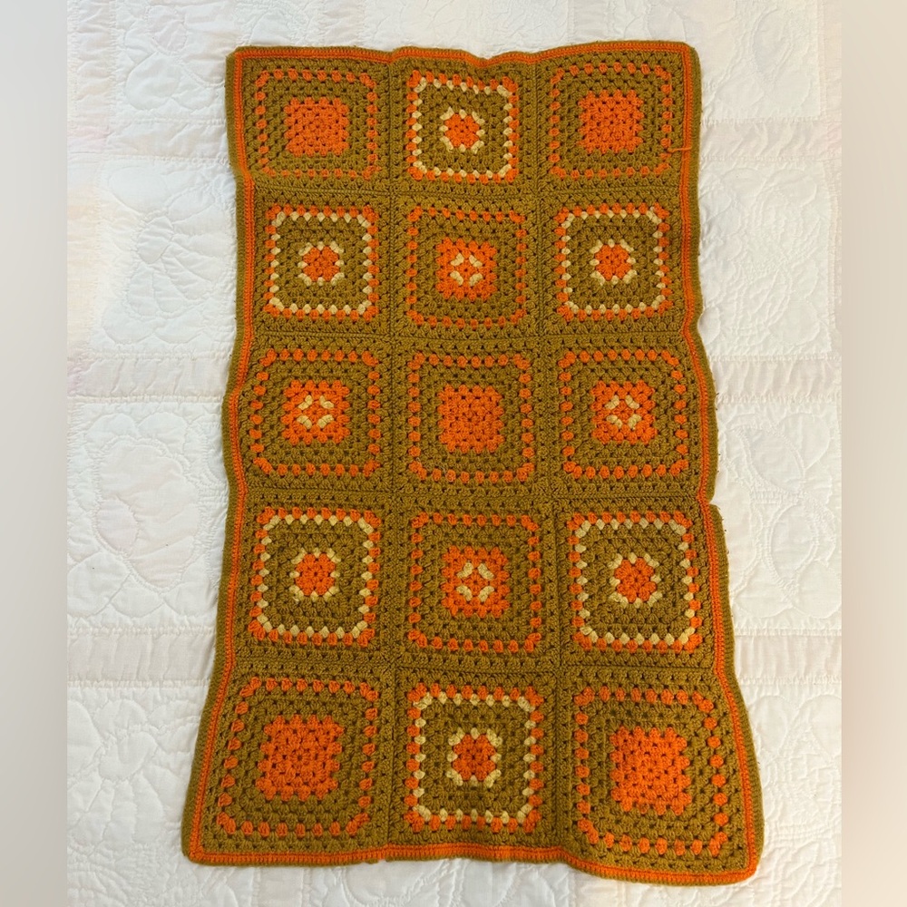 Vintage crocheted lap quilt. 26x44